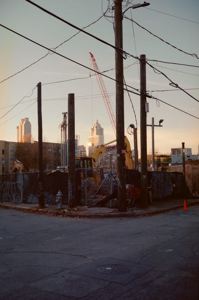 Photo of a construction site in front of a skyline scene shot on a Fuji GW690.